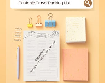 May include: A flat lay featuring a travel packing list with the text "Printable Travel Packing List". The image includes paper clips, binder clips, a pen, and two notepads. The packing list has a checklist format.