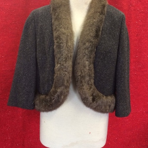 Charcoal grey jacket trimmed in fur