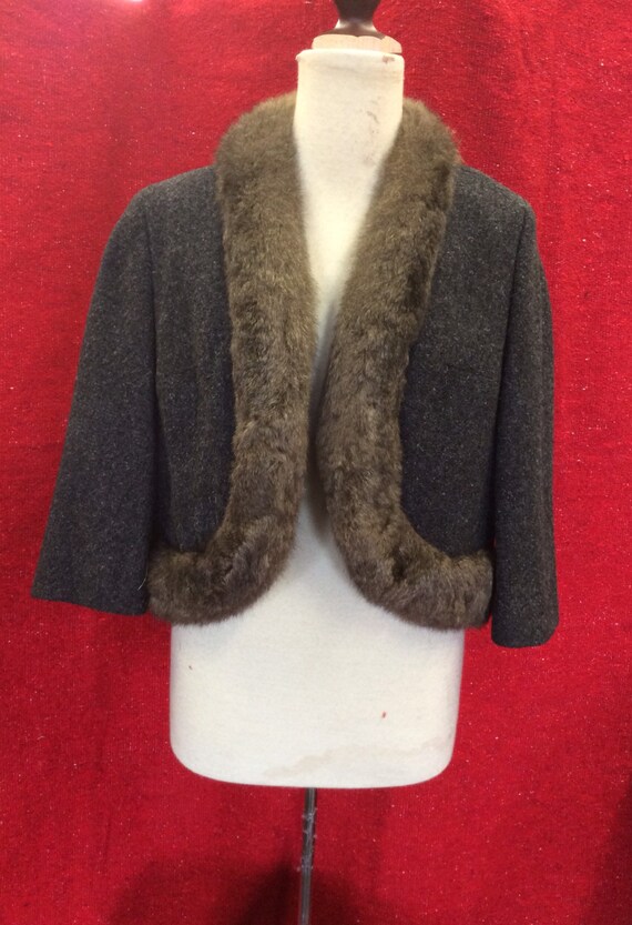 Charcoal grey jacket trimmed in fur