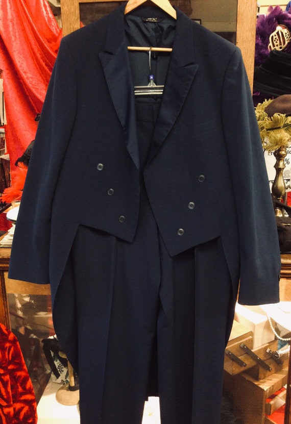 Dark navy blue cutaway tuxedo from After Six