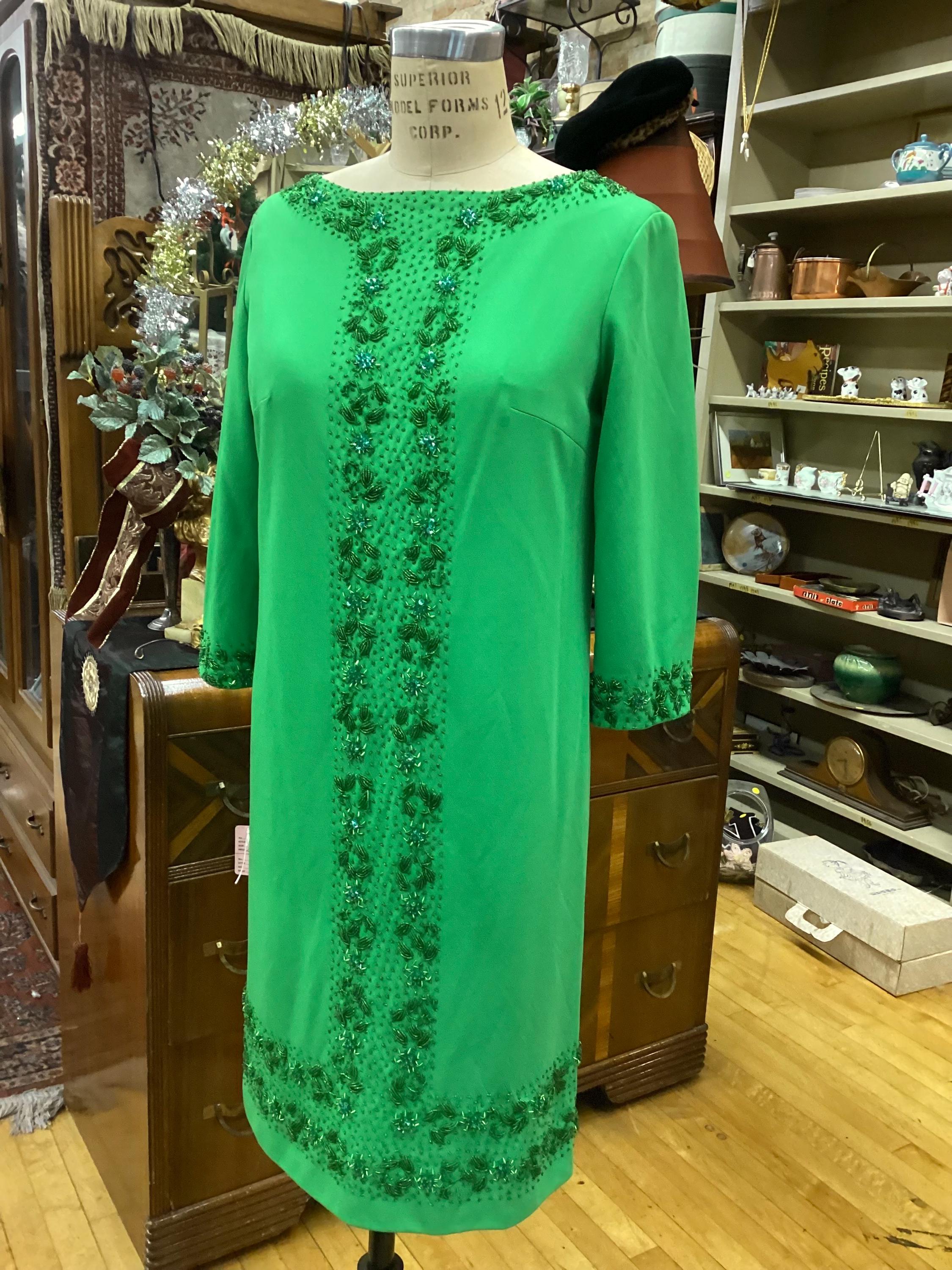 1970s green poly beaded sheath dress from Sammy Wong Imports