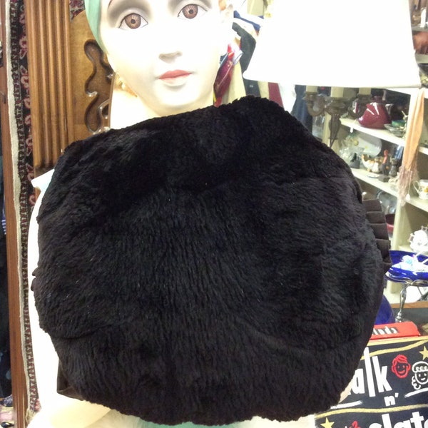 Black fur muff from the 40's. Sonja Henie eat your heart out! (if you don't know, look her up)