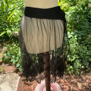 Asymmetrical black lace overskirt from the early 1920s is in great condition, and this one&#39;s for the curvy girls!