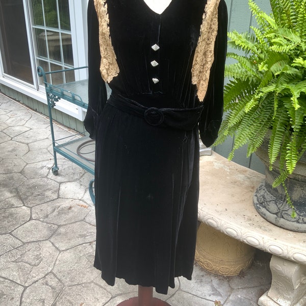 Black velvet bias cut dress from the 1930s with lace insets