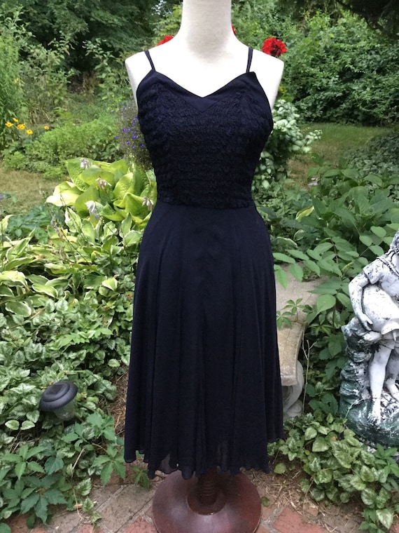 1950s dark navy dress in sleek silk with smoking … - image 1