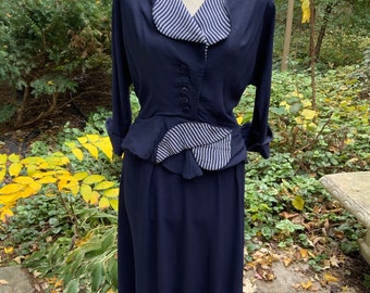 1950s navy matte crepe dress with stripes at the collar and peplum (it's not tiny!)