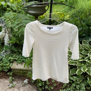 White lace shift dress by My Michelle is a bit of 70s style