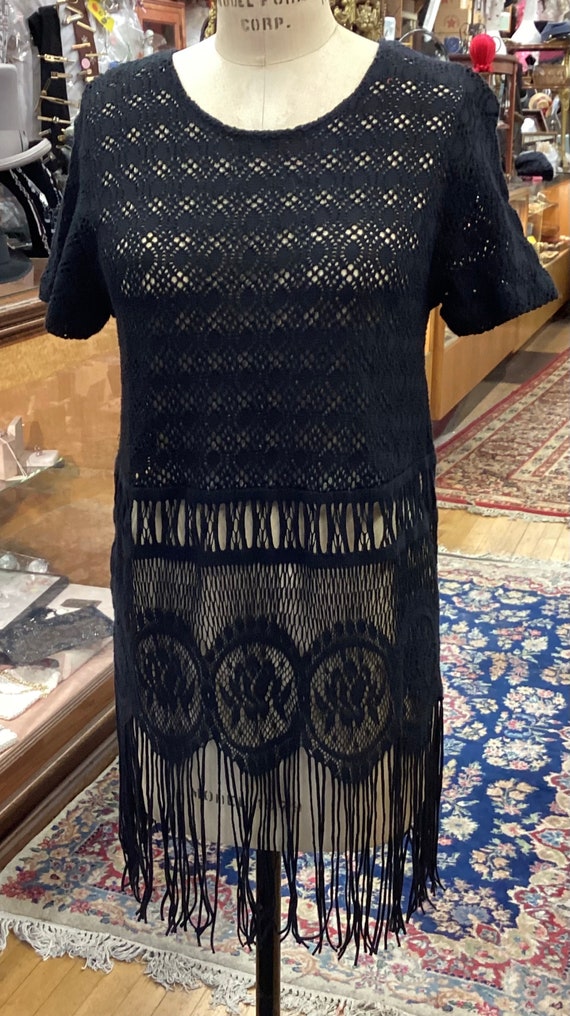 Lace tunic with vertical slashing