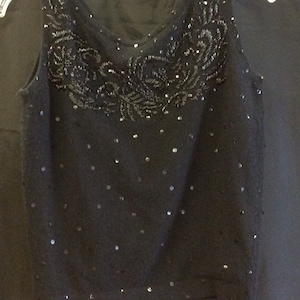 Black sleeveless sweater from Banff Ltd is 1960s treasure