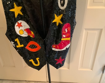 Unique sequin vest by Gunit has a football theme