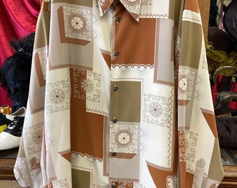 Men's shirt by Pentium Unlimited of LA with abstract geometrics harkens back to the leisure shirts of the 1970s
