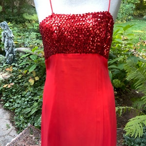 Red over orange empire gown from the 1970s with a dash of sparkle
