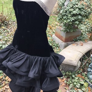 Thank you, 1980s, for this strapless black velvet dress with brilliant rhinestones.