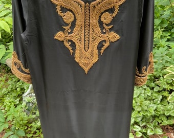 Salwar kameez suit in black silk with gold trim from the early 2000s