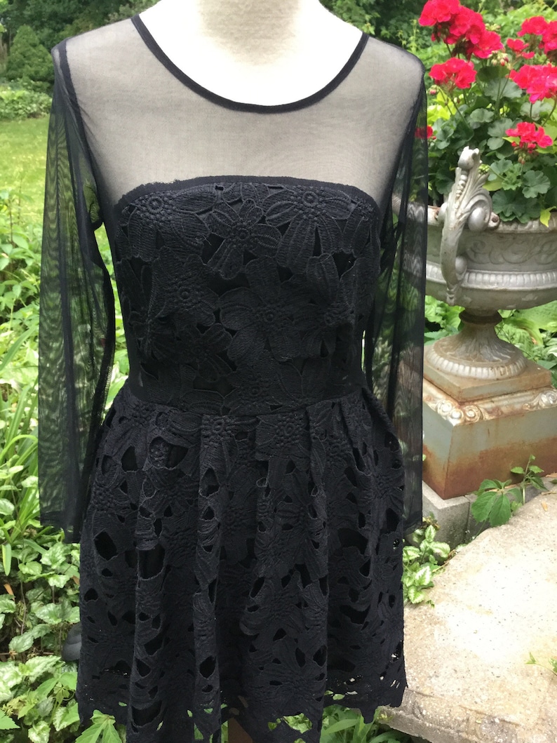 Little black dress with Battenberg lace and a touch of scandal