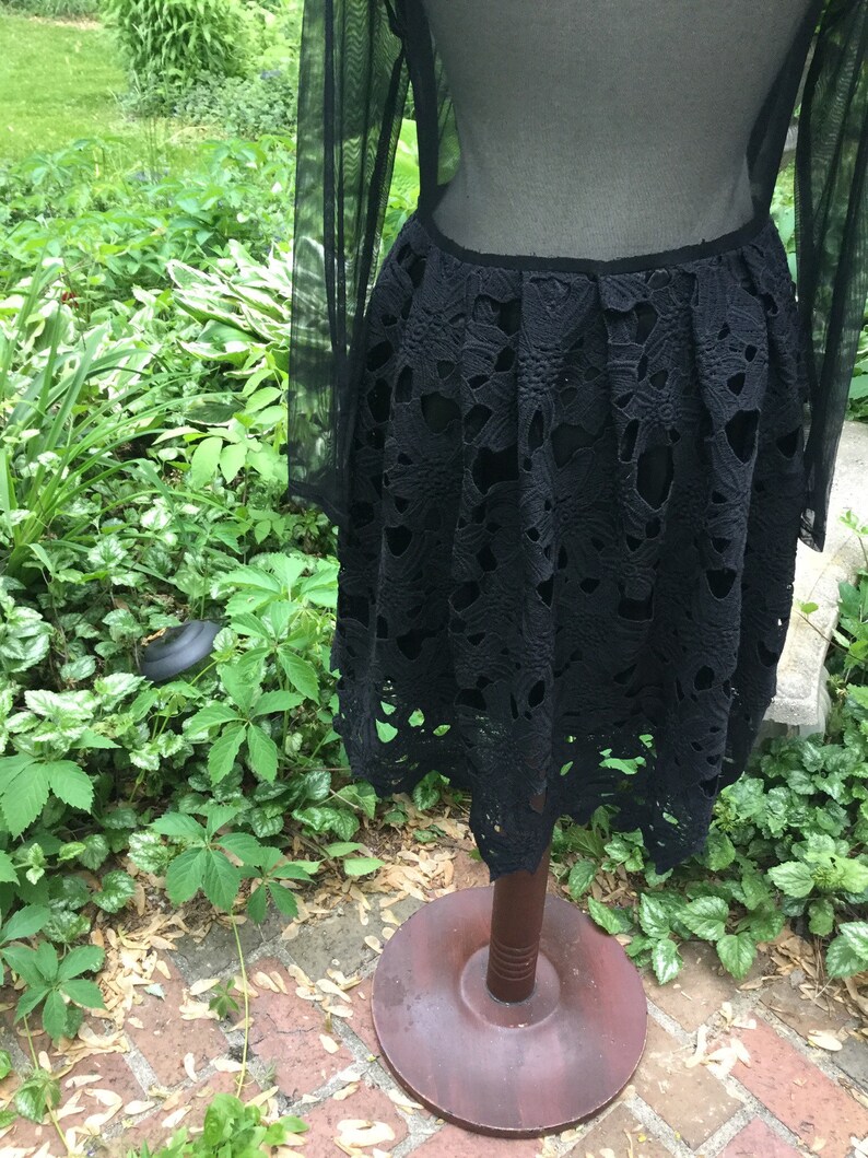 Little black dress with Battenberg lace and a touch of scandal