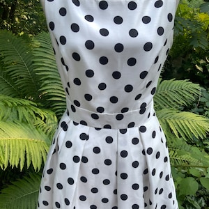 Classic black polka dots on this sweet dress by Jessica Howard