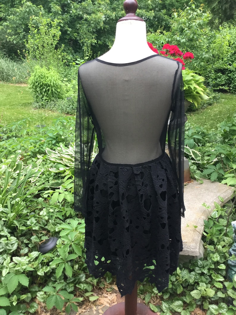Little black dress with Battenberg lace and a touch of scandal