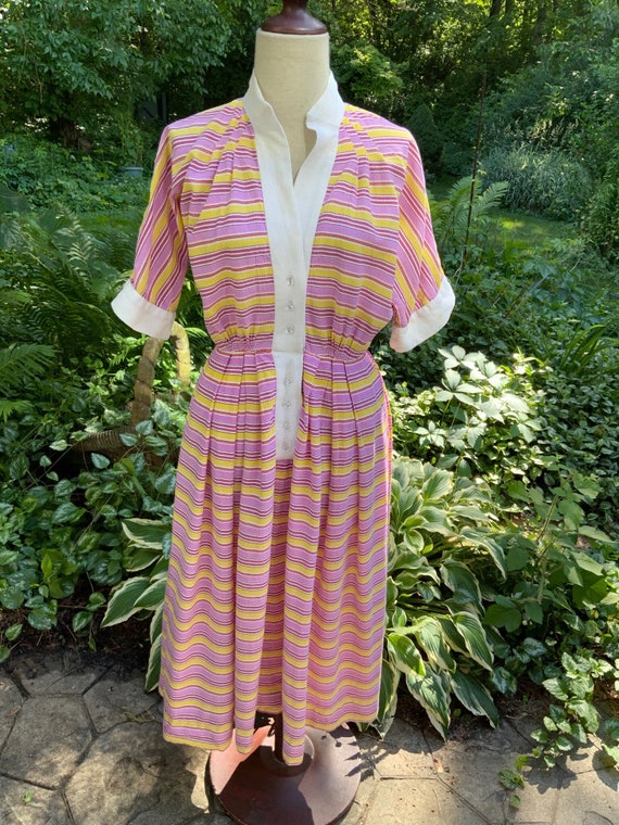 Pink and yellow striped seersucker dress from the 