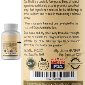 May include: A white bottle of Ojas Shield capsules with a white lid. The label includes text about the product's natural ingredients and FDA registration. The bottle is labeled with a batch number, manufacturing date, and expiration date.