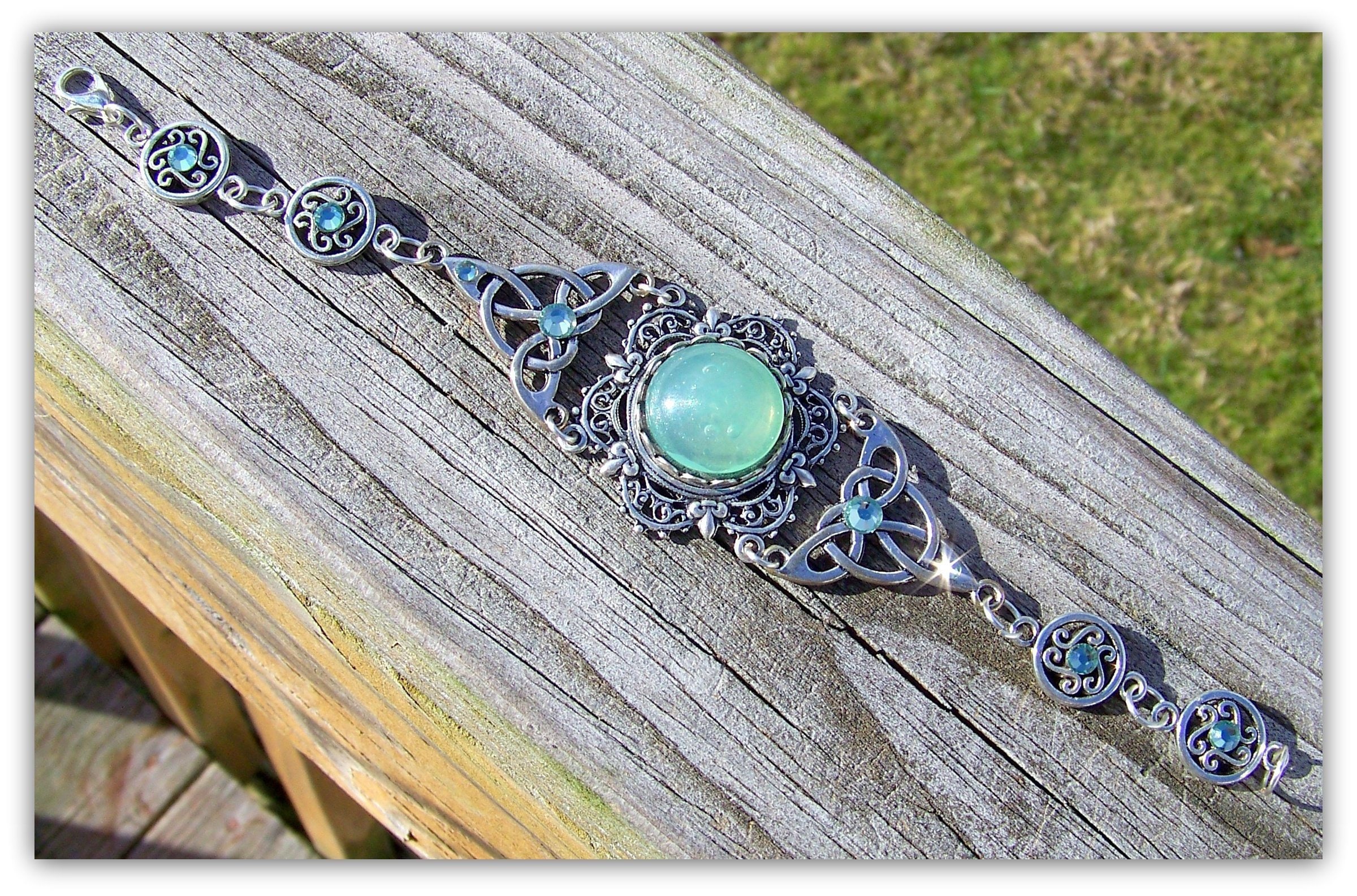 Celtic Knot Bracelet - Silver Triquetra Filigree Light Green Cabochon Crystals