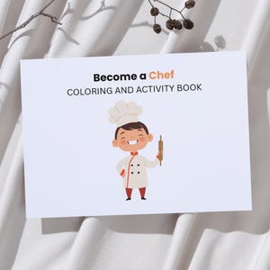 以下が含まれることがあります： 「Become a Chef」というタイトルの白い塗り絵とアクティビティブック。表紙には、白い帽子と制服を着た漫画のシェフが、めん棒を持っています。本は白い表面にあります。