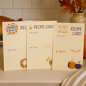 May include: Three beige recipe cards with fall-themed designs. One card reads "Thanks Gurrs" and another says "Recipe Card". The third card says "thankful grateful blessed". Each card has space for ingredients and directions.