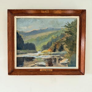 油彩画 川と崖の風景
