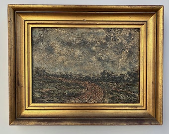 May include: An oil painting in a thick gold frame featuring a textured landscape with a winding dirt path, dark green foliage, and a cloudy, moody sky. The artwork displays heavy impasto brushwork and a signature in the bottom right corner.