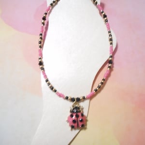 Pink, Black, And Gold Ladybug Charm Ankle Bracelet