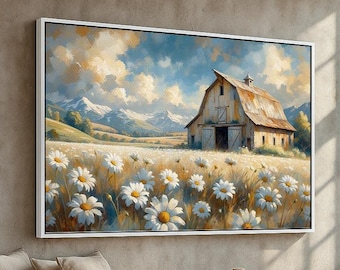 May include: A framed landscape painting depicts a rustic barn in a field of daisies under a cloudy sky. The artwork features a white frame and a serene, pastoral scene with mountains in the background.
