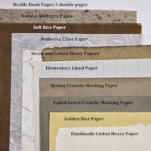 May include: A stack of various paper types, including Natural Mulberry, Soft Rice, and Mulberry Fiber. The image also shows Elementary Lined Paper, Brown Crunchy Masking Paper, and Golden Rice Paper. Text at the top reads "Braille Book Pages-3 double pages."