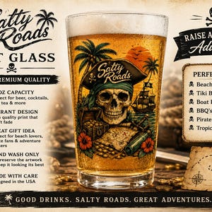 May include: A 16 oz clear pint glass featuring a colorful pirate-themed graphic with a skull wearing a tricorn hat, a treasure chest, a map, and a ship. The text reads Salty Roads, Pint Glass, Raise a Glass to Adventure, and Good Drinks, Salty Roads, Great Adventures.