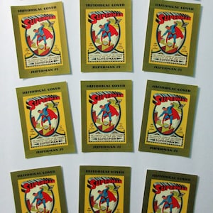 May include: Twelve vintage comic book covers featuring Superman. Each cover is yellow with a red and blue illustration of Superman flying. The text on each cover reads "Historical Cover", "Superman #1", "The Complete Story of the Daring Exploits of the One and Only Superman", and "64 Pages All Full Color Action".