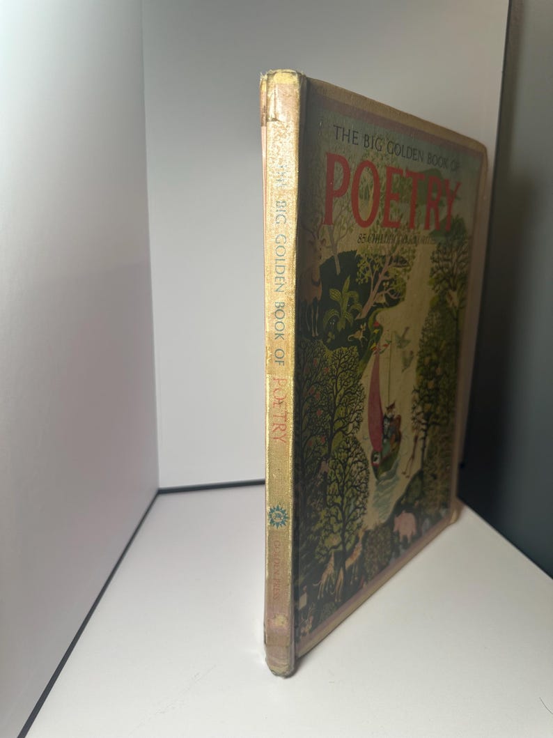 May include: Vintage "The Big Golden Book of Poetry" with a colorful cover illustration. The cover features a whimsical scene with trees, figures, and the title in red. The spine displays the title and publisher.
