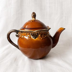 Regency Brown Ceramic Teapot and Bronze Handle Teapot - Karidesign - Certified International - Discontinued