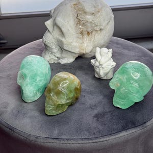 Skullz natural stone carvings with geodes