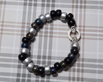 Pulseira com 2 caveiras