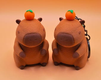 3D Printed Capybara Figurine or Keychain: Turtle Backpack & Orange Hat