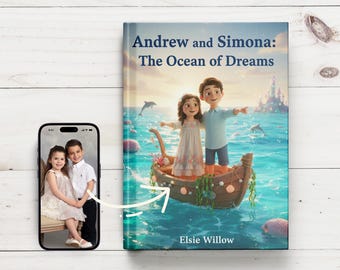 May include: A children's book titled "Andrew and Simona: The Ocean of Dreams" with an illustration of two children in a boat on the ocean. A smartphone displays a photo of two children. The book cover features dolphins and a castle.