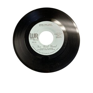 Vintage 7” 45 RPM vinyl record Sea Bird Band got to get away shine the light
