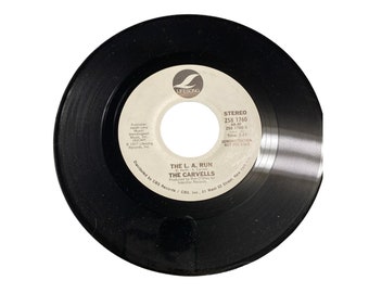 Vintage 7” 45 RPM vinyl record The Carvells The L.A run