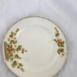 Vintage Crown Potteries Co small plate orange floral pattern