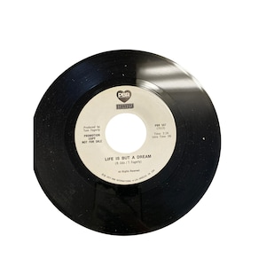 Vintage 7” 45 RPM vinyl record Ruby running back to me life is but a dream