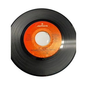 Vintage 7” vinyl record 45 RPM Bachman-Turner Overdrive tramp let it ride