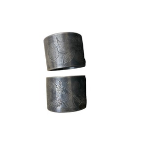 Vintage set of 2 floral accent heavy pewter? napkin rings