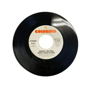 Vintage 7” 45 RPM vinyl record Johnny Mathis when a child is born