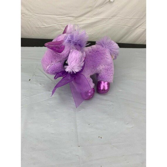 pink and purple unicorn stuffed animal