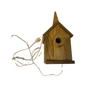 Handmade wooden lighted birdhouse church