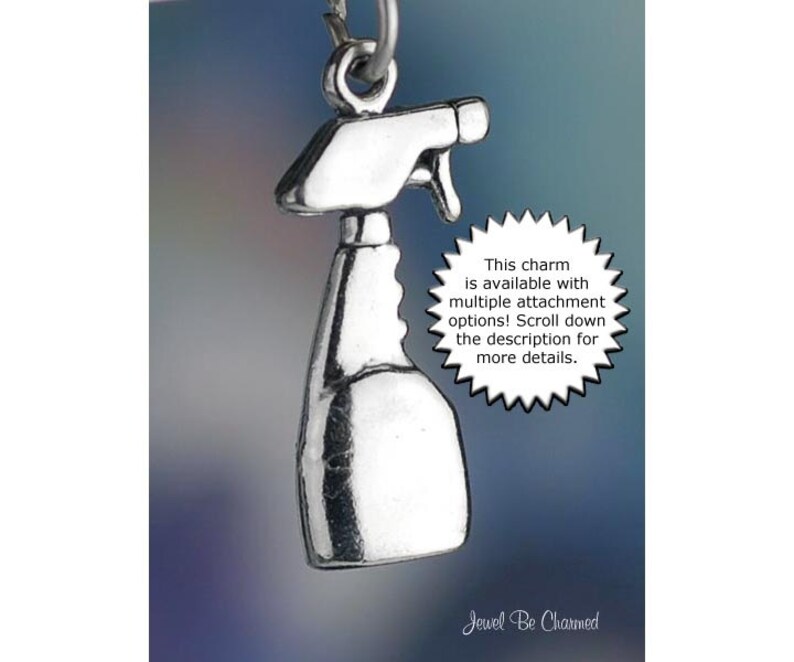 May include: Silver charm in the shape of a spray bottle. The charm is available with multiple attachment options. The text "This charm is available with multiple attachment options! Scroll down the description for more details." is printed on a white starburst.